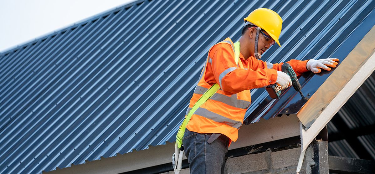 Metal Roof Installation Worker